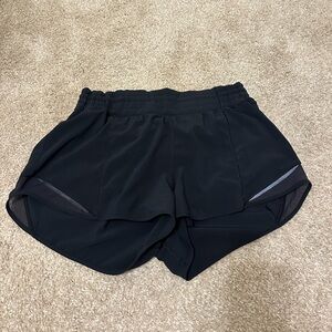 Lululemon size 8, black, high rise, hotty hot, 2.5 inseam